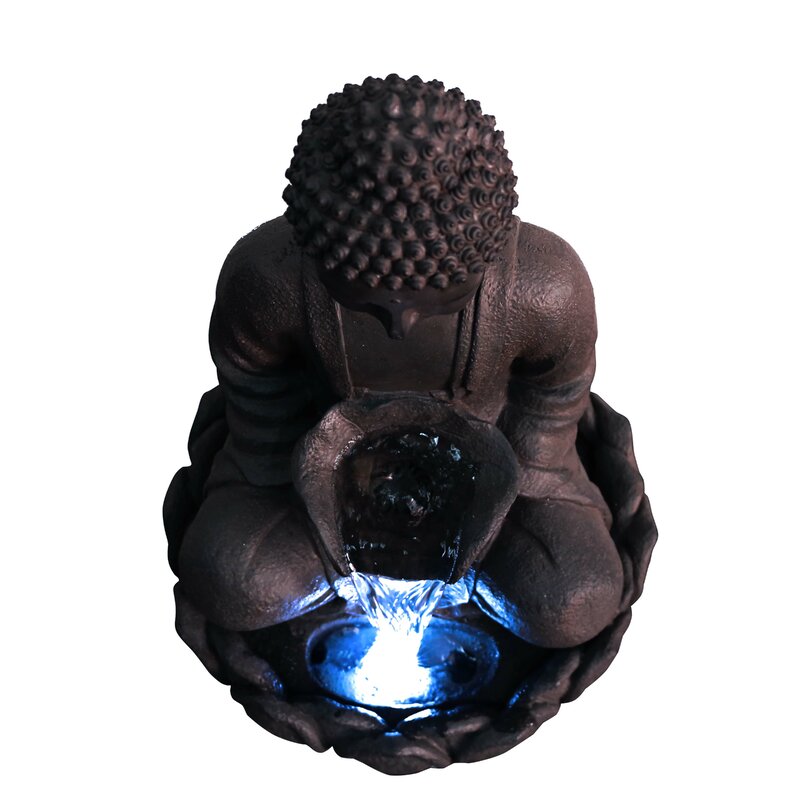 resin meditating buddha on column patio fountain with led light